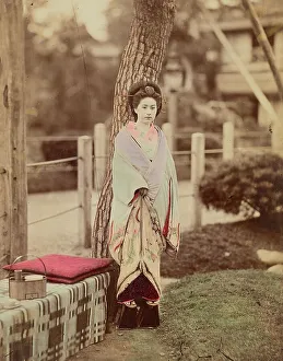 Geta Prints: Girl standing near tree, 1870s-1890s. Creator: Kusakabe Kimbei