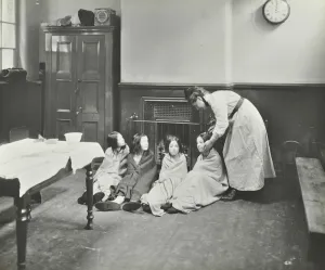 Clean Prints: Girls drying their hair by the fire after a bath, Chaucer Cleansing Station, London, 1911