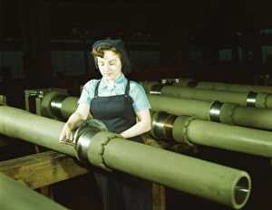 Gist inspector, Mrs. Mary Betchner inspecting one of the 25 cutters... Milwaukee, Wis., 1943. Creator: Howard Hollem