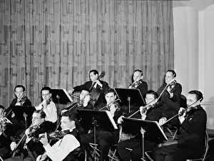 Music Stand Prints: Glenn Miller Orchestra(?), New York, N.Y.(?), 1938. Creator: William Paul Gottlieb