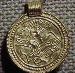 Wotan Prints: Gold bracteate depicting a horse and bird, 5th century