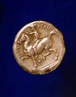 Gold coin with Philip II (382-336 a.C.), king of Macedonia