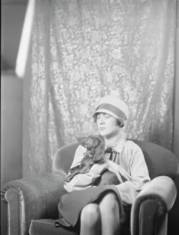 Cloche Hat Prints: Goldbeck, Walter, Mrs. with dog, portrait photograph, 1926 Oct. 18. Creator: Arnold Genthe