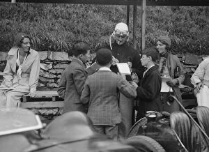 Goggles Gallery: Goldie Gardner signing autographs at the Irish Grand Prix, Phoenix Park, Dublin, 1930