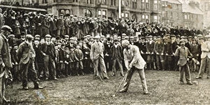 Caddy Gallery: Golfer about to tee off at a tournament, 1902