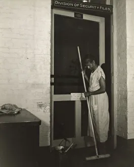 Government charwoman cleaning after regular working hours, Washington, D. C. 1942. Creator: Gordon Parks