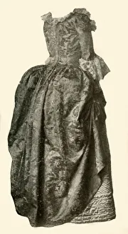 Damask Prints: Gown of yellow damask brocade worn over a blue quilted satin petticoat, c1710-1730, (1937)