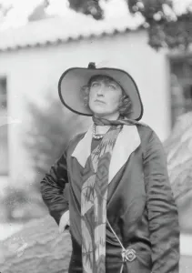 Neckscarf Prints: Graham, Mrs. standing outdoors, 1927 Creator: Arnold Genthe