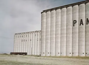 Atsf Prints: Grain elevators near Amarillo, Texas; Santa Fe trip, 1943. Creator: Jack Delano