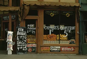 Oranges Prints: Grand Grocery Co. Lincoln, Neb. 1942. Creator: John Vachon