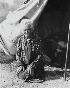 Okie Prints: Grandmother of twenty-two children, from a farm in Oklahoma, 1936. Creator: Dorothea Lange