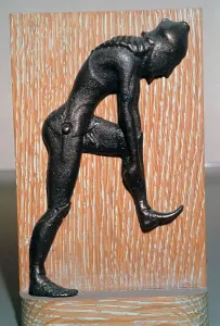 Greek bronze hoplite putting on armour, 5th century BC