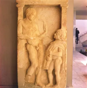 Greek Relief of Young man holding Strygil with Boy holding Oil Vessel, c400 BC Greek Relief of Young man holding Strygil with Boy holding Oil Vessel, c400 BC