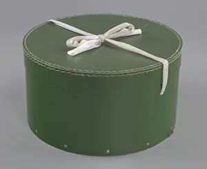 Green circular hatbox with lid from Mae's Millinery Shop, 1941-1994. Creator: Unknown Green circular hatbox with lid from Mae's Millinery Shop, 1941-1994. Creator: Unknown