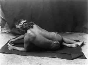 Witch Doctor Prints: Grinding medicine-Zuni, c1903. Creator: Edward Sheriff Curtis