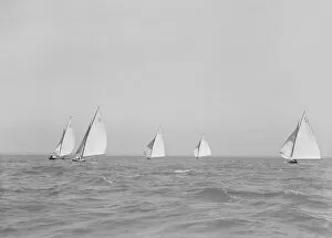 Group of 6 Metres racing downwind, 1911. Creator: Kirk & Sons of Cowes
