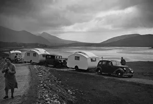 Highlands Scotland Prints: Group of cars and caravans camping in Scottish Highlands 1930 s. Creator: Unknown