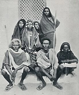 Spear Collection: Group of Danakil men and women from the Italian port, Assab Bay, Eritrea, 1912