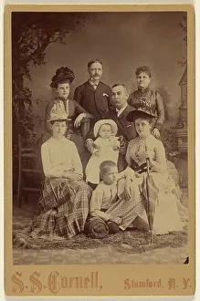 Card Photograph Prints: Group family portrait of eight members, 1889. Creator: SS Cornell