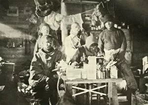 South Pole Collection: Group in the Hut in the Summer: Joyce at the Sewing Machine, 1908, (1909)