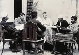 Burma Prints: A group of men taking notes at a table