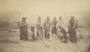 Telegraph Poles Prints: Group of Native American Men, Telegraph Poles in Background, 1880s-90s. Creator: Unknown