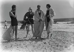 Swimming Costumes Prints: Group of people at Long Beach, New York, between 1896 and 1942. Creator: Arnold Genthe