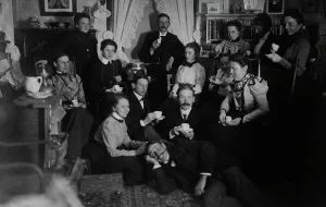 Cup And Saucer Prints: Group portrait of friends at social gathering