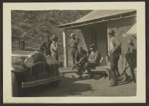 Stoop Prints: Group Portrait Outside Building, 1907-1943. Creator: Louis Fleckenstein