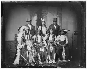 Feather Collection: Group of Sioux Indians 'Spotted Tail'(photo c. 1875). Creator: Unknown