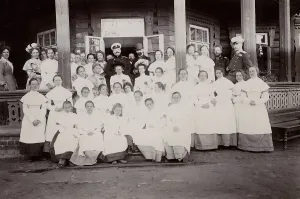 Dacha Prints: A group of students from the Maiden Institute with teachers on the porch of the dacha