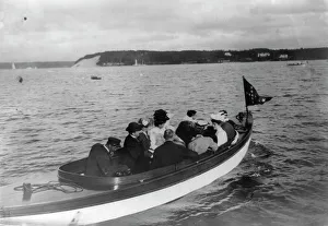 Group of well-dressed men and women in motorboat, Oyster Bay, Long Island, N.Y. 1905. Creator: Frances Benjamin Johnston