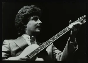 Forum Theatre Prints: Guitarist Martin Taylor playing at the Forum Theatre, Hatfield, Hertfordshire, 1983