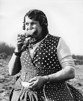Gipsy Gallery: Gypsy woman eating, 1960s