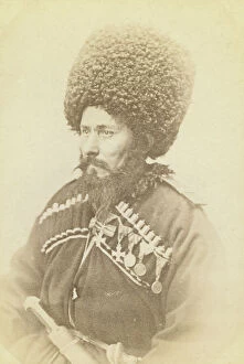 Warrior Collection: Half-length portrait of Daghestani man, facing left, between 1870 and 1886. Creator: Unknown