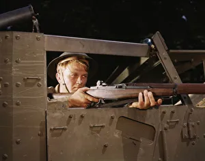 Halftrack infantryman with Garand rifle, Ft. Knox, Ky. 1942. Creator: Alfred T Palmer