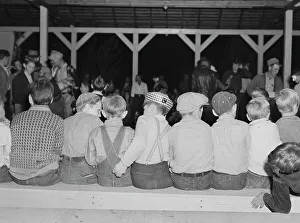 Caps Prints: Halloween party at Shafter camp for migrants, California, 1938. Creator: Dorothea Lange
