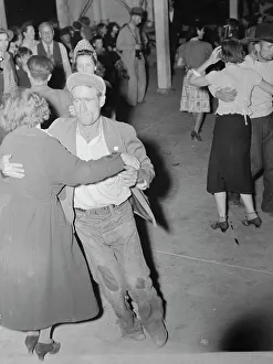 Halloween Prints: Halloween party at Shafter migrant camp, California, 1938. Creator: Dorothea Lange