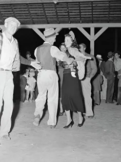 Halloween Prints: Halloween party at Shafter migrant camp, California, 1938. Creator: Dorothea Lange