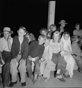 Halloween Prints: Halloween party at Shafter migrant camp, California, 1938. Creator: Dorothea Lange