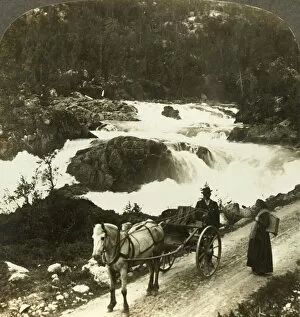 Halt of a stolkjaerre on the Telemarken road beside the foaming Little Rjukan Falls