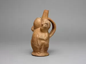 Lambayeque Gallery: Handle Spout Vessel in the Form of a Seated Man Carrying a Jar, A.D. 700 / 1000