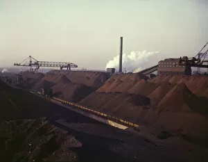 Machine Collection: Hanna furnaces of the Great Lakes Steel Coporation, stock pile of coal and... Detroit, Mich. 1942