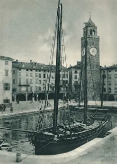 Lake Garda Prints: Harbour and Torre Apponale, Riva del Garda, Italy, 1927. Artist: Eugen Poppel