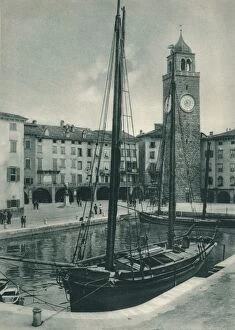 Harbour and Torre Apponale, Riva del Garda, Italy, 1927. Artist: Eugen Poppel