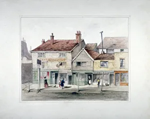 Th Shepherd Prints: The Hare and Hounds Inn and shopfronts on Upper Street, Islington, London, c1835