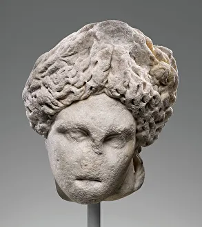 Sun God Prints: Head of Apollo (Lykeios-Cyrene type), 2nd century A.D. Creator: Unknown