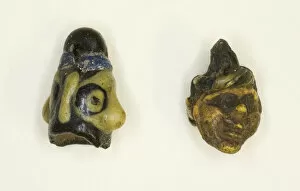 Arts Of Africa Collection: Head Pendants, Carthage, Roman Period (30 BC-395 AD). Creator: Unknown
