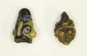 Carthage Prints: Head Pendants, Carthage, Roman Period (30 BC-395 AD). Creator: Unknown