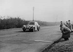 Test Prints: Healey Elliott on test in Italy 1946. Creator: Unknown